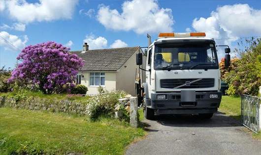 The yellow tanker on a customer's drive